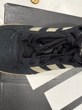 adidas Black and Gold Low-Top Sneakers